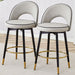 Set of two Giga modern upholstered bar stools with 360° rotatable seats and metal legs, ideal for dining room seating.