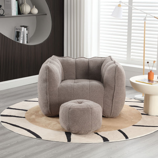 Giga soft bean bag chair with high resilient foam, shown as a stationary chair and ottoman in a cozy home setting