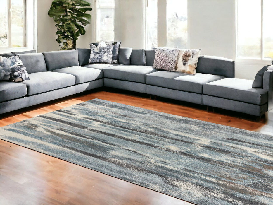 7' x 10' Polypropylene Area Rug - Teal