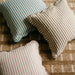 TOV Furniture striped accent cushion with colorful horizontal stripes, soft fabric, and decorative throw pillow for sofa or bed.