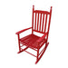 Giga wooden porch rocker chair with curved armrests and slatted back, designed for outdoor relaxation on a porch.