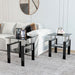 Set of two Giga modern black tempered glass end tables for living room, square design with sleek, contemporary style.