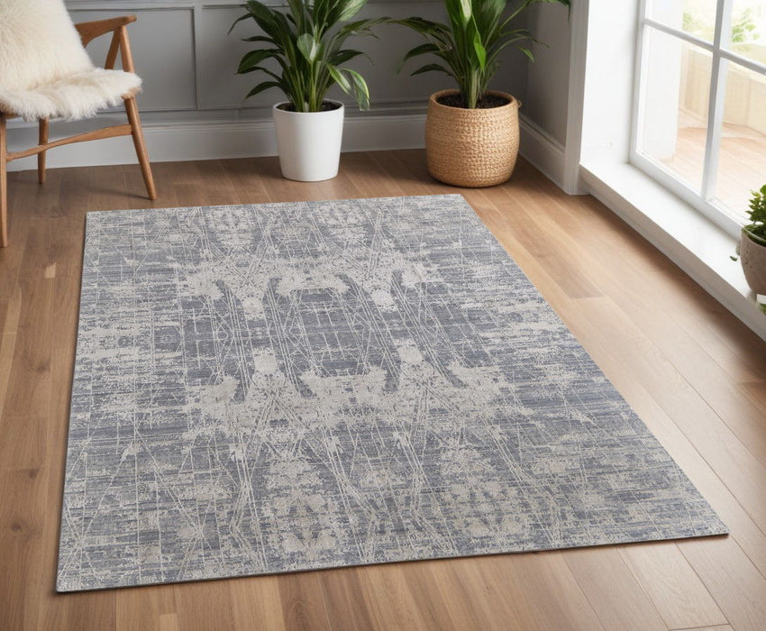 4' x 6' Casual Abstract Hand Woven Worn Faded Wool Blend Area Rug - Gray And Silver