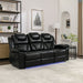 Giga home theater reclining sofa with manual recliner, center console, and LED light strip for living room comfort and style.