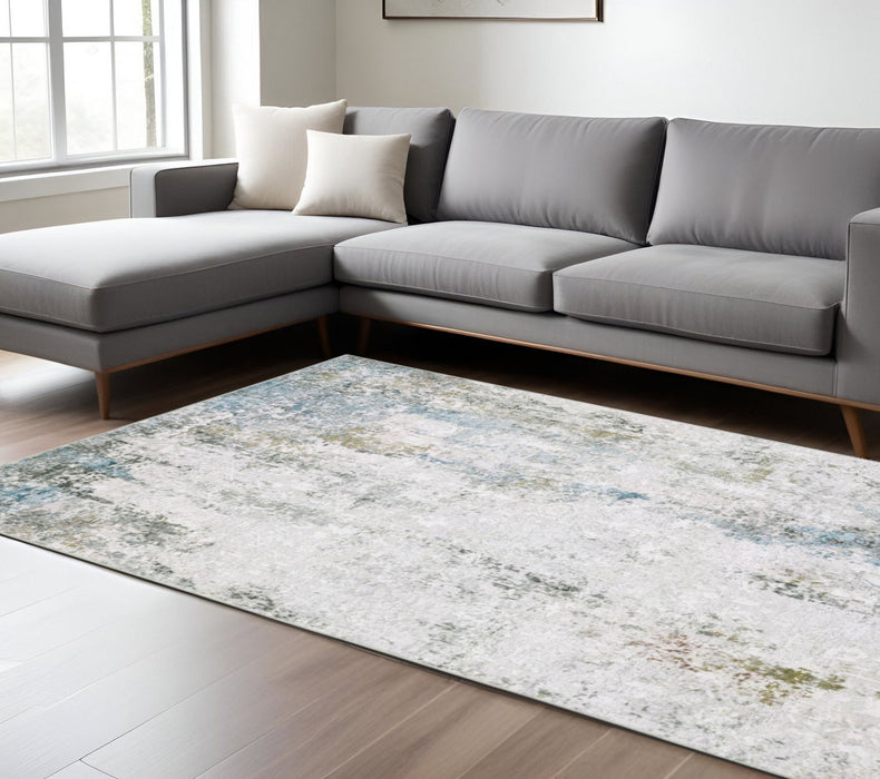 8' x 10' Abstract Printed Stain Resistant Non Skid Area Rug - Ivory Teal Blue Gray Brown And Gold