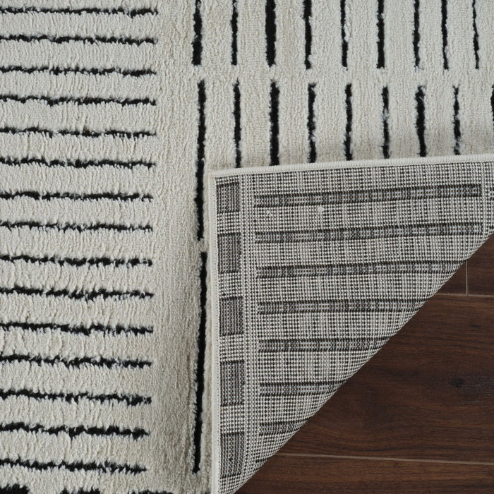7.9' x 7.9' Abstract Distressed Polypropylene Area Rug - Cream And Black
