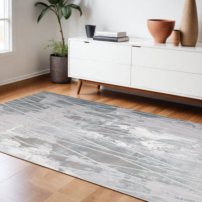 8' x 11' Abstract Stain Resistant Area Rug - Blue