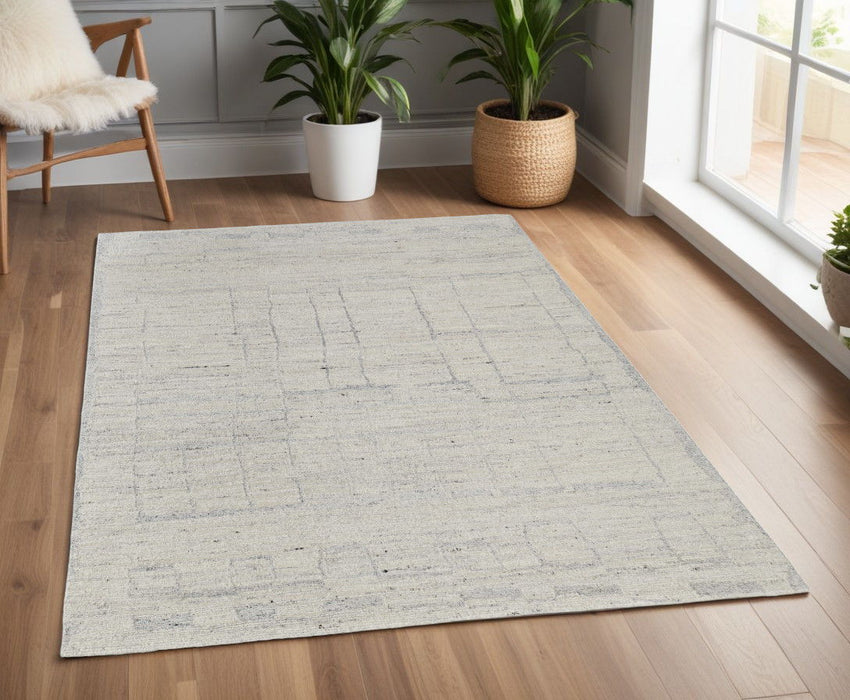 3.5' x 5.5' Abstract Hand Woven Worn Faded Area Rug - Gray And Ivory