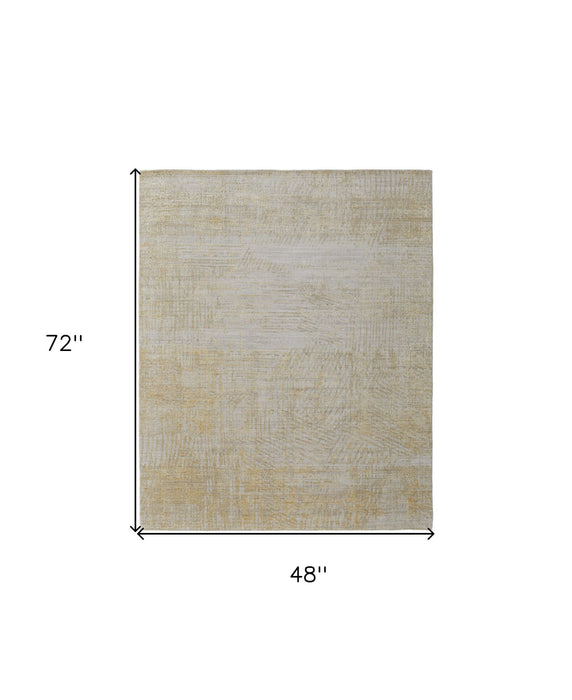 4' x 6' Abstract Hand Woven Wool Blend Area Rug - Yellow And Ivory