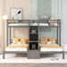 Gray Giga twin over twin bunk bed with built-in staircase and storage drawers, showcasing sturdy construction and space-saving design.