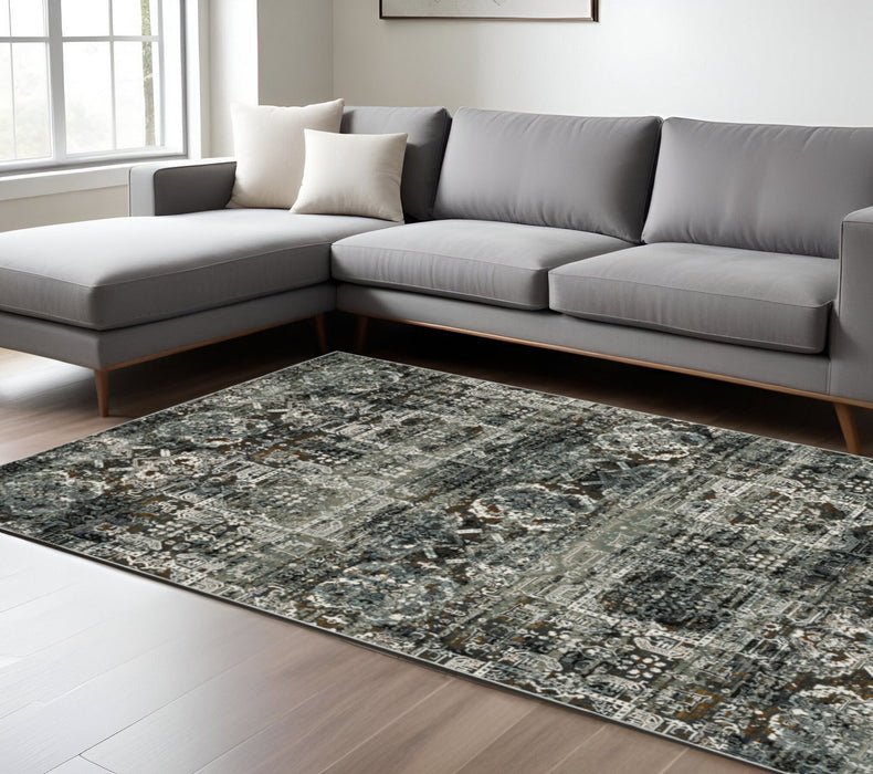 6.6' x 9.5' Oriental Power Loom Stain Resistant Area Rug - Ivory Charcoal Grey Blue Rust Gold And Brown