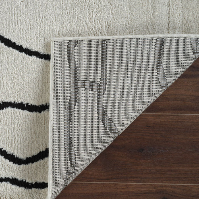 8' x 11' Abstract Distressed Area Rug - Cream And Black