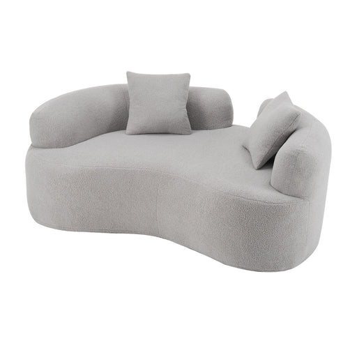 Giga modern curved loveseat sofa in a stationary design with plush cushions and sleek upholstery, perfect for contemporary living rooms.