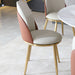 Pair of Giga modern dining chairs with beige upholstered seats and gold metal legs, set of two for contemporary dining rooms
