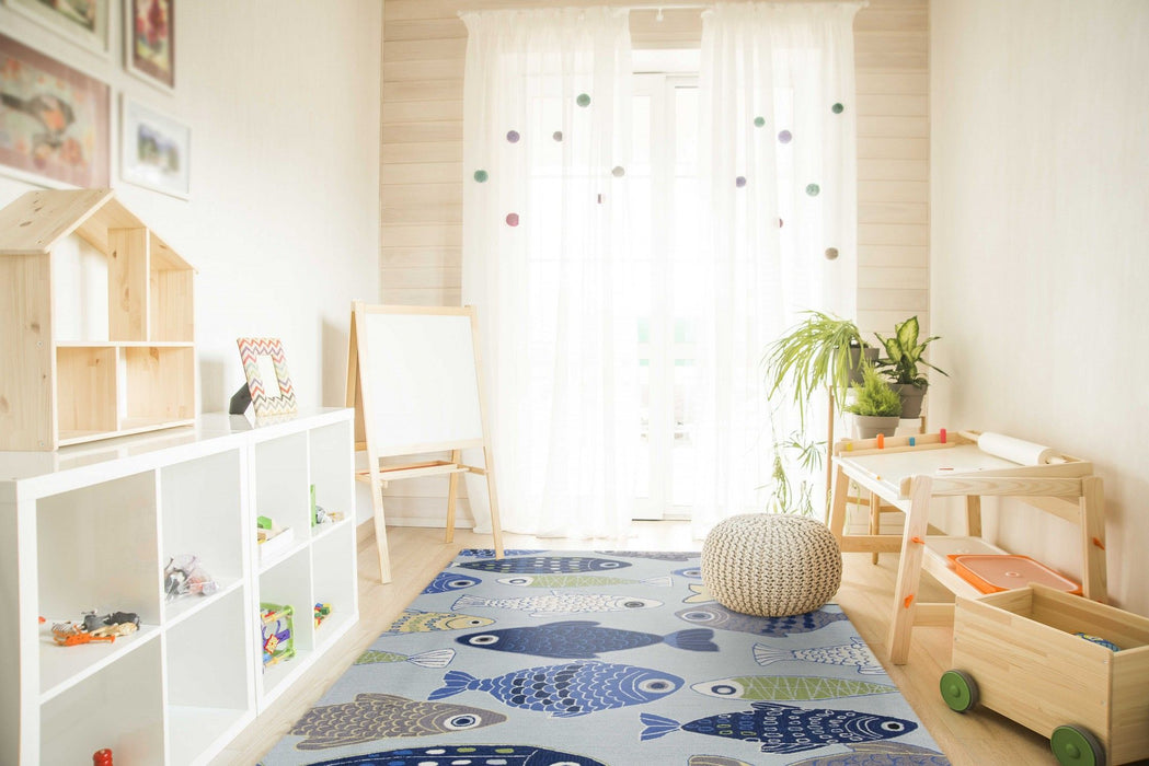 7' x 9' Polyester Area Rug - Light Blue