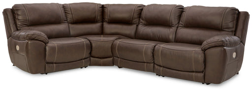 Chocolate Dunleith 4-piece power reclining sectional by Signature Design by Ashley®, featuring plush cushions and reclining seats.