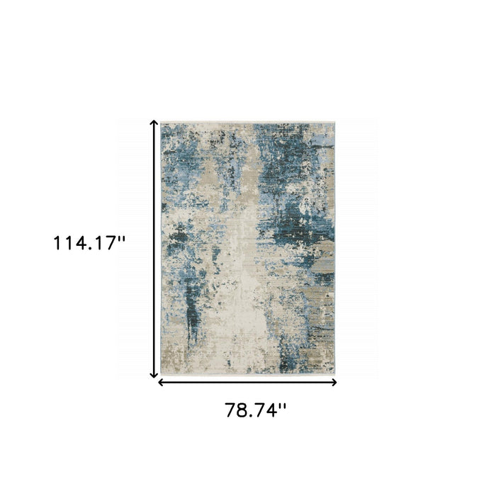 6' x 9' Abstract Power Loom Stain Resistant Area Rug With Fringe - Blue Gray Ivory Light Blue And Dark Blue