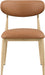 Vegan leather upholstered Meridian Furniture Ronda dining side chair with natural wooden legs, modern design and comfortable seating.