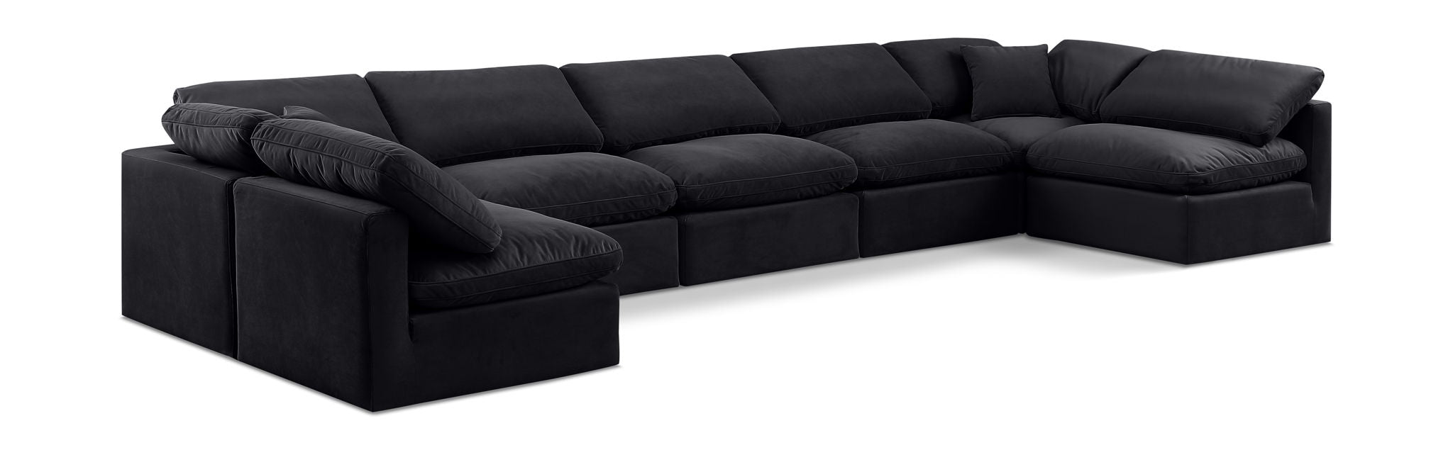 Meridian Furniture Indulge velvet 7-piece modular U-shaped sectional sofa in a cozy living room setting.