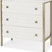 Wood and metal accent cabinet with gold and white finish, featuring carved geometric designs and three drawers for stylish storage.