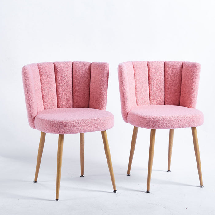 Set of two Giga modern dining chairs with wood-colored iron tube legs, cushioned seats, and supportive backrests.