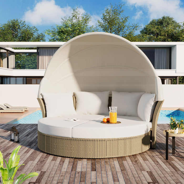 Giga outdoor wicker rattan double daybed with retractable canopy, round sofa furniture set with four pillows, ideal for lawn or garden.
