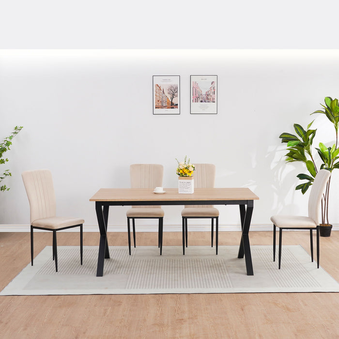 Set of four Giga velvet dining chairs with plush upholstery and modern design, ideal for stylish dining room seating.