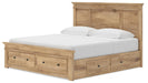 Signature Design by Ashley Makidern Panel Storage Bed with built-in drawers and sleek wood finish in a modern bedroom setting.