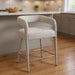 Ivory modern metal and fabric low back counter height bar chair with sleek design, suitable for kitchen or bar area.