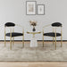 Set of 2 Giga mid-century modern dining chairs with boucle round backrests and metal legs, ideal for kitchen or dining room.