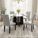 Giga 5-piece round dining table set with four upholstered chairs in white and gray for dining, kitchen, or living room.