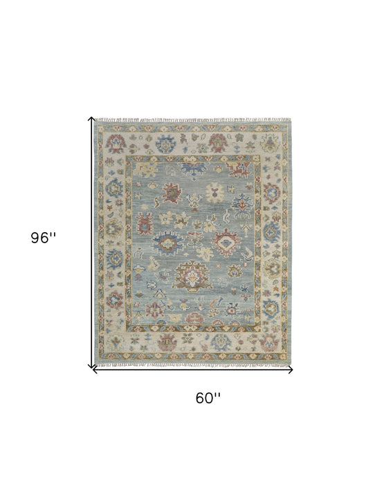 5' x 8' Wool Floral Hand Knotted Area Rug With Fringe - Blue Ivory And Yellow