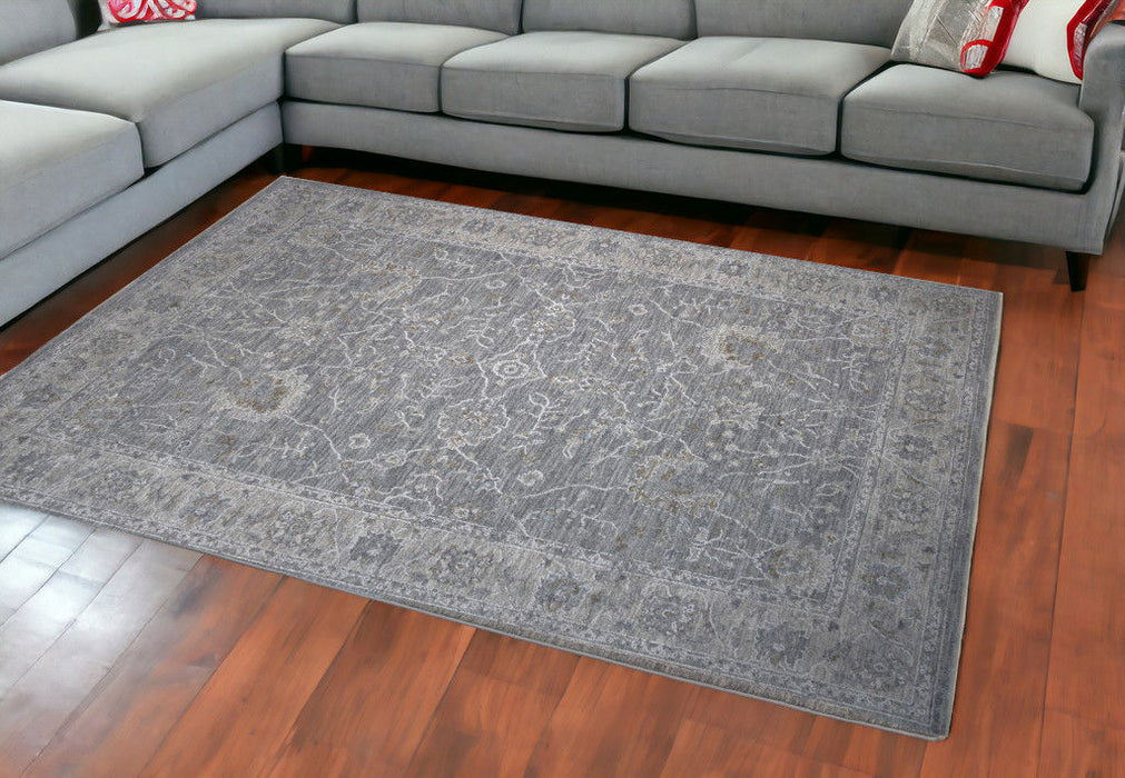 9' x 12' Southwestern Floral Stain Resistant Area Rug - Blue Gray