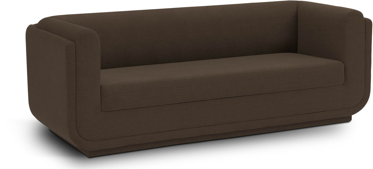 Kimora stationary sofa by Meridian Furniture with plush cushions and modern design, shown in a cozy living room setting.
