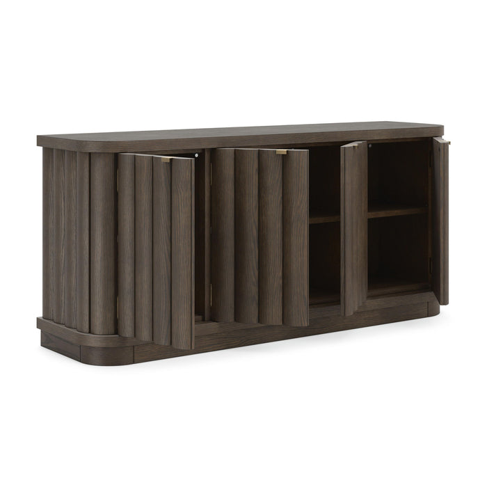 Extra large Signature Design by Ashley Darimore TV stand in burnished brown with open shelves and storage compartments.
