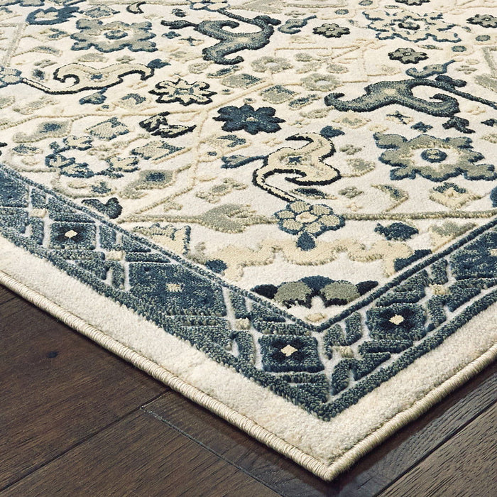 10' x 13' Oriental Power Loom Stain Resistant Area Rug - Ivory Navy And Gold