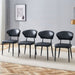 Set of four Giga minimalist ergonomic dining chairs with curved backs, modern design, and sleek wood finish.