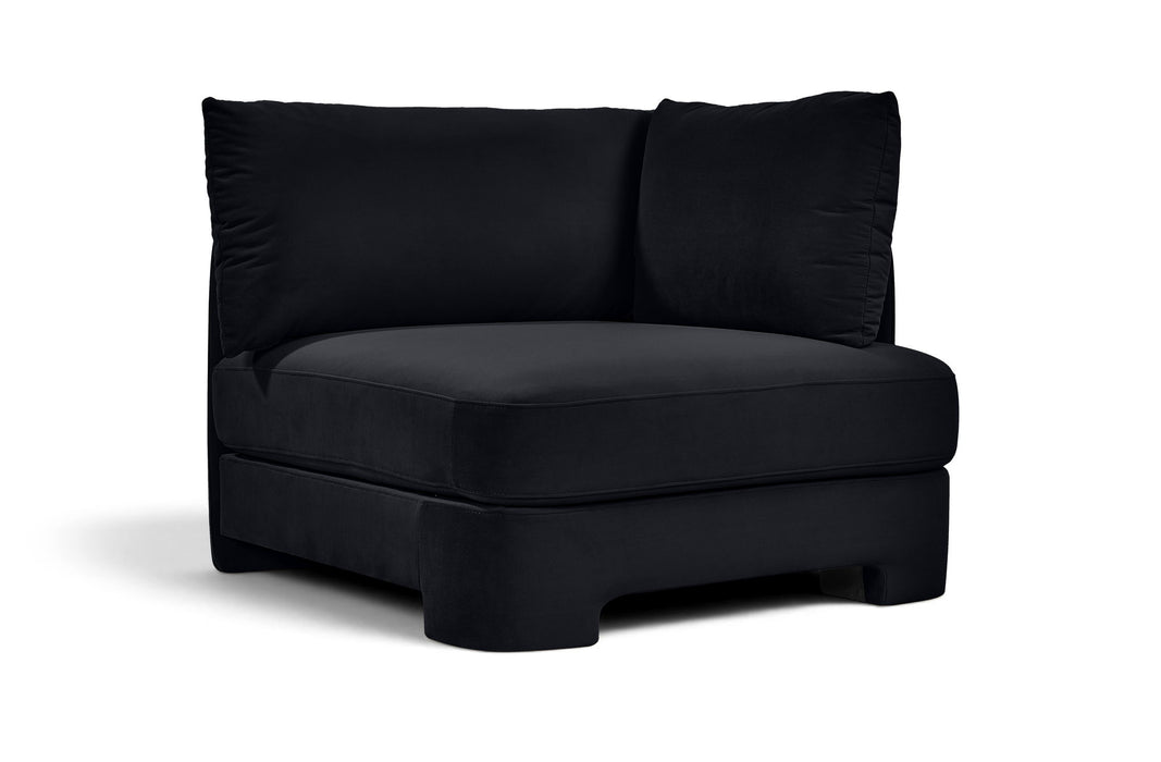 Meridian Furniture Hammond velvet upholstered stationary chair with plush fabric and modern design, shown in a cozy living room setting.
