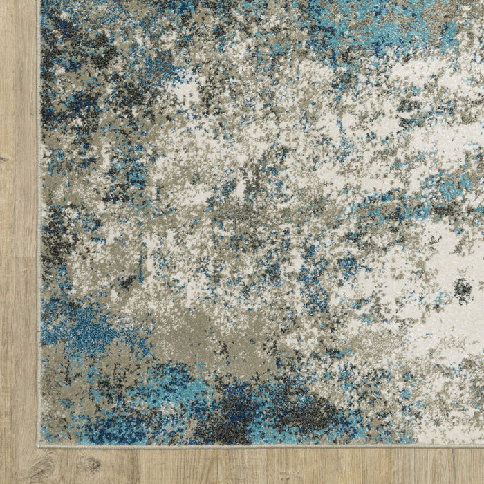 6' x 9' Abstract Power Loom Stain Resistant Area Rug - Blue Gray And Beige