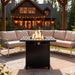 Giga Square 2-in-1 outdoor propane fire pit table in black with stainless steel burner, lava rocks, lid, and waterproof cover.