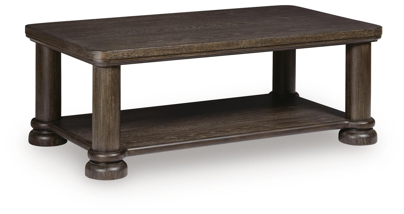 Rectangular cocktail table from Signature Design by Ashley, featuring a sleek wooden surface and modern design.