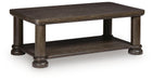 Rectangular cocktail table from Signature Design by Ashley, featuring a sleek wooden surface and modern design.
