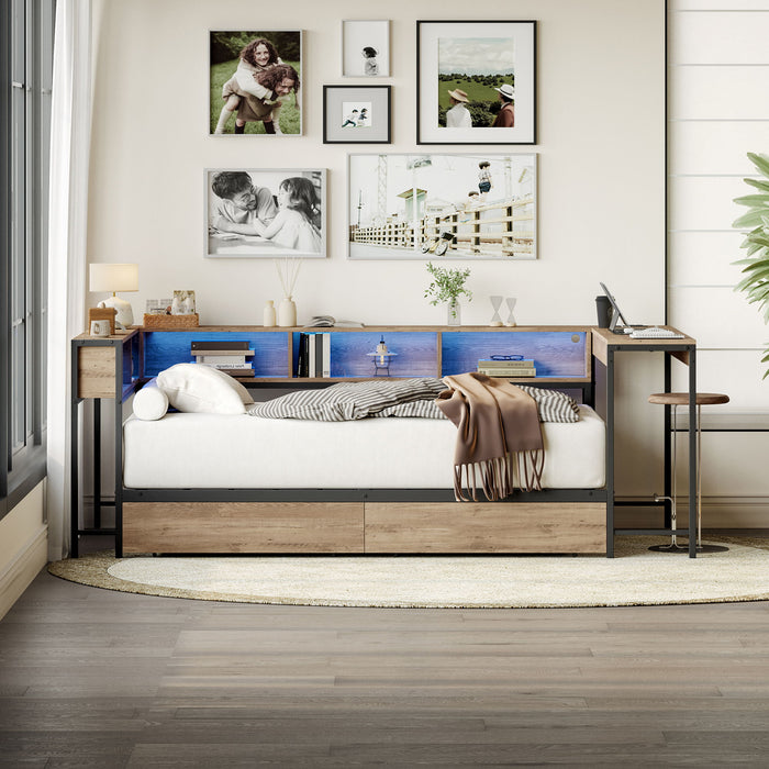 Gray Giga corner twin bed frame with built-in bookcase, underbed storage drawers, LED light, charging station, reversible design.