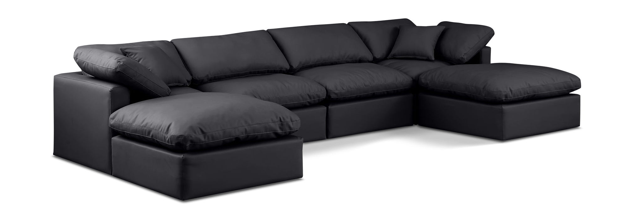 Faux leather Meridian Furniture Indulge 6-piece modular double chaise sectional with plush cushions and modern design.