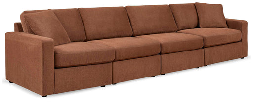Signature Design by Ashley Modmax 4-piece stationary sectional sofa with plush cushions and modern design in a neutral fabric.