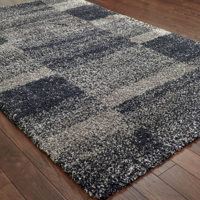 9.8' x 12.8' Geometric Shag Power Loom Stain Resistant Area Rug - Charcoal Silver And Grey