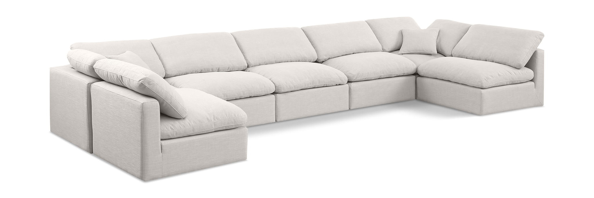 Meridian Furniture Indulge Linen 7-Piece Modular U-Shaped Sectional with plush cushions and modern design in a living room setting.