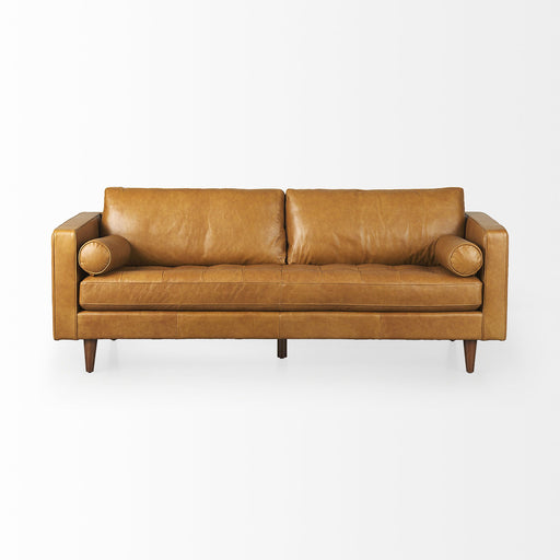 Brown leather sofa with matching toss pillows, stationary design by HomeRoots, shown in a modern living room setting.