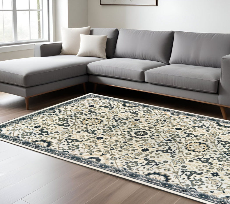 6' x 9' Oriental Power Loom Stain Resistant Area Rug - Ivory Navy And Gold