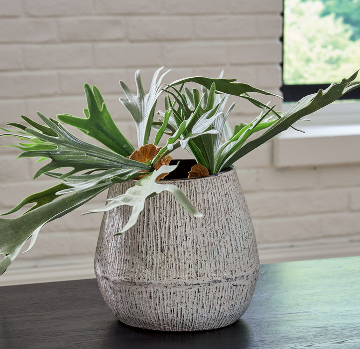 Distressed brown claymount vase, 10-inch tall, from Signature Design by Ashley, showcasing a rustic, textured ceramic finish.
